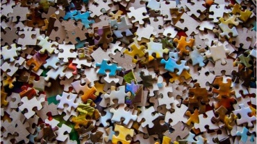 Puzzle pieces scattered